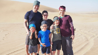 Canadian family in sand dunes